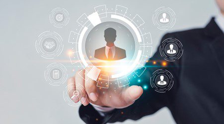 Businessman holding virtual social media icons.