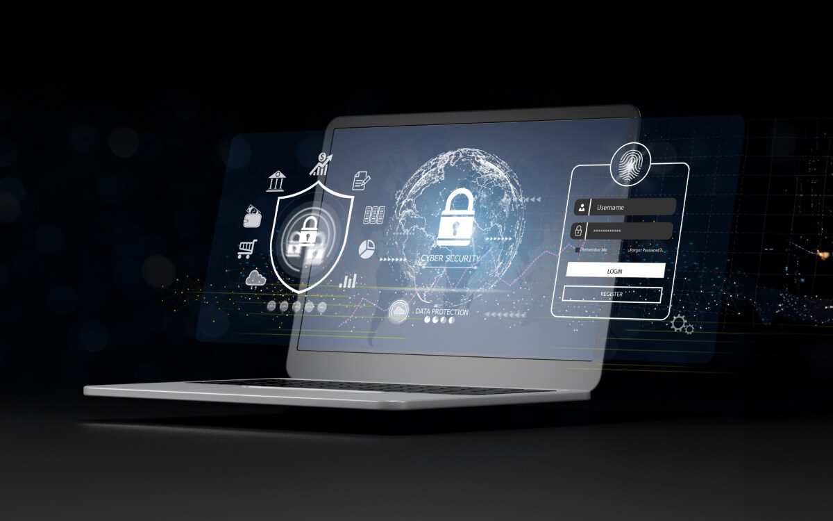 A Modern Laptop Open on a Desk Displaying Graphics Related to Cybersecurity.