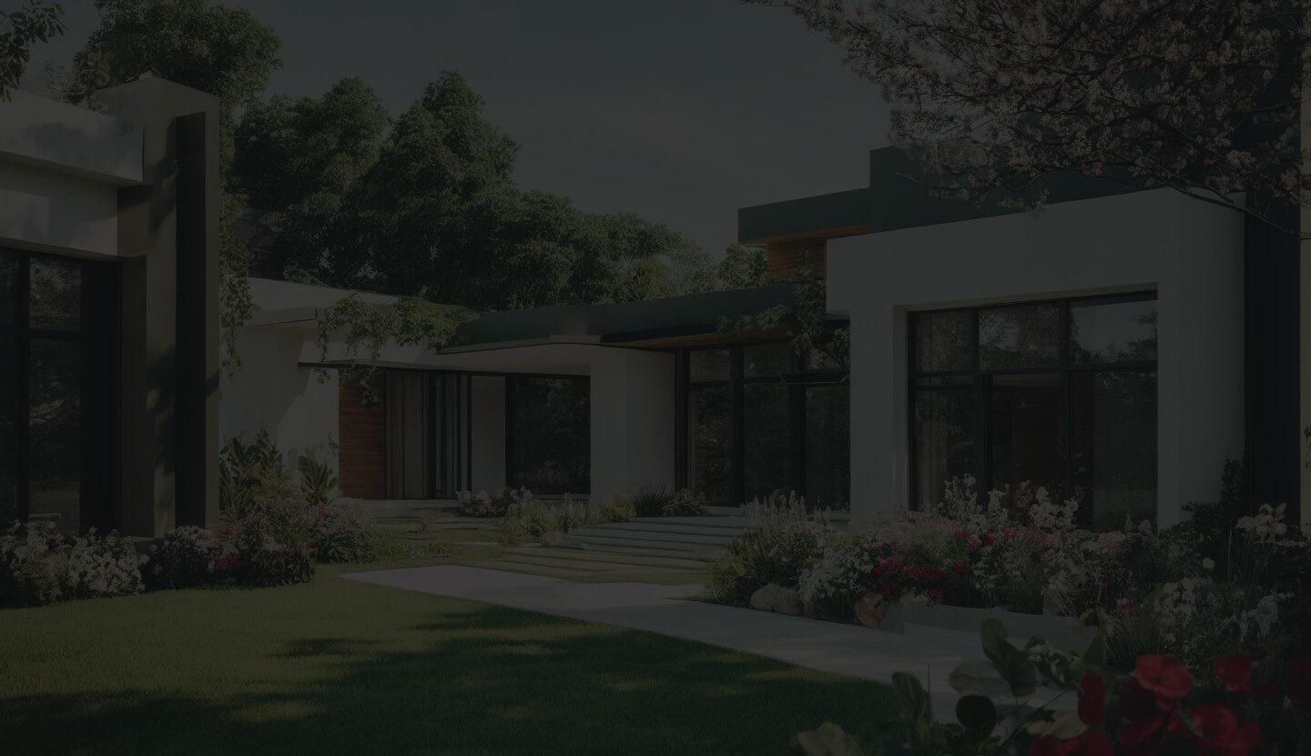 A Modern House With Large Windows Surrounded by a Beautifully Landscaped Garden.