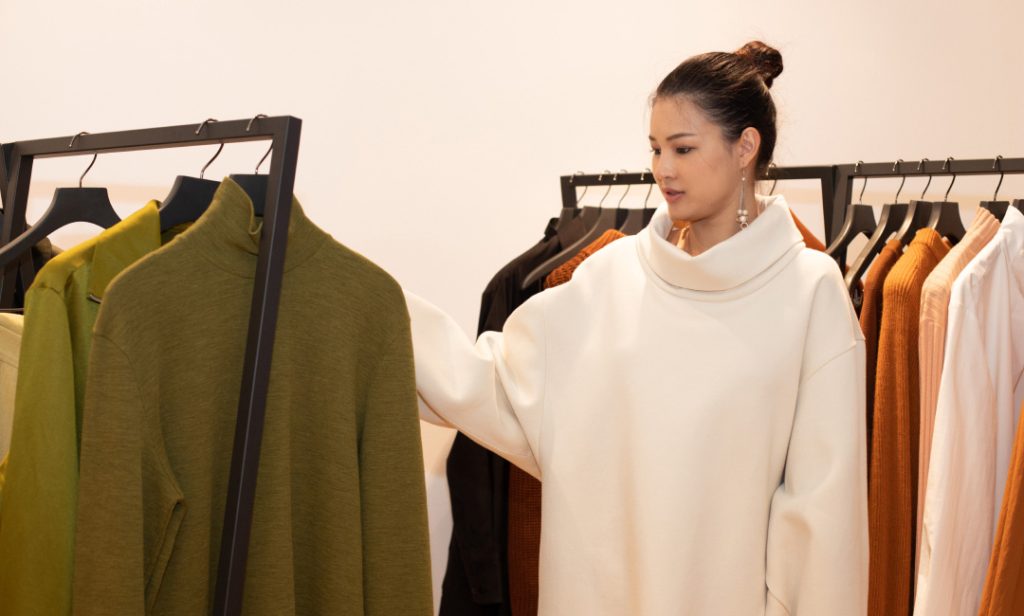 Women Selecting Winter Fashion Collection